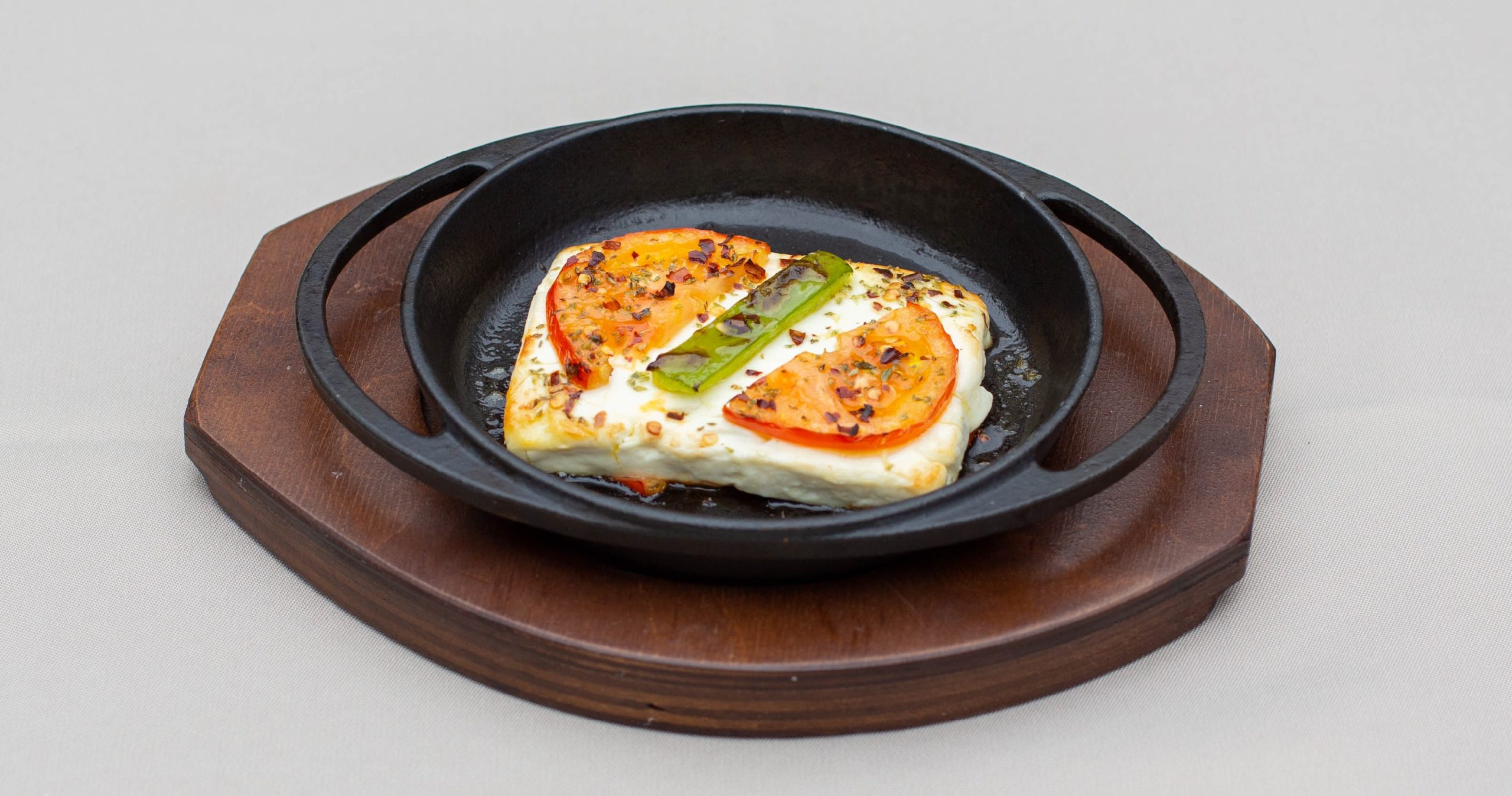 Spicy baked cheese