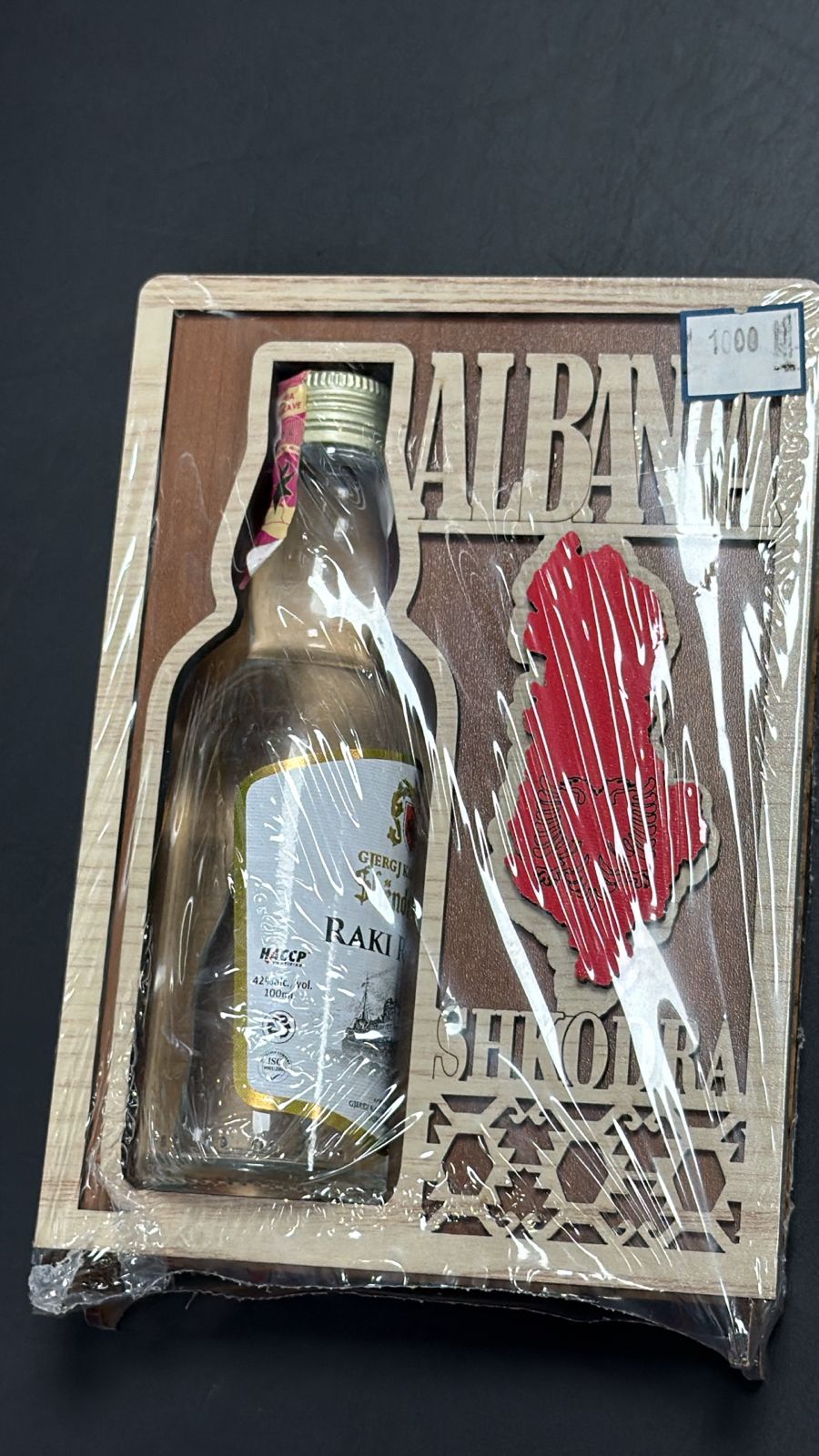 Raki bottle & albanian woodwork